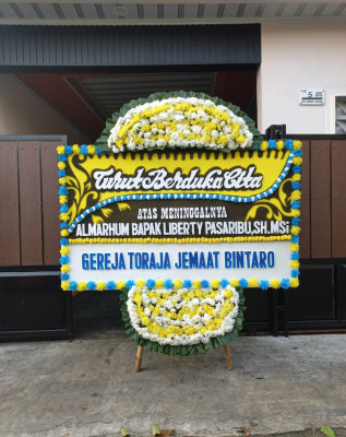Papan Bunga Duka di Passo