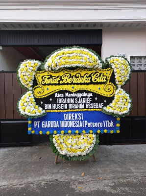 Papan Bunga Duka di Passo